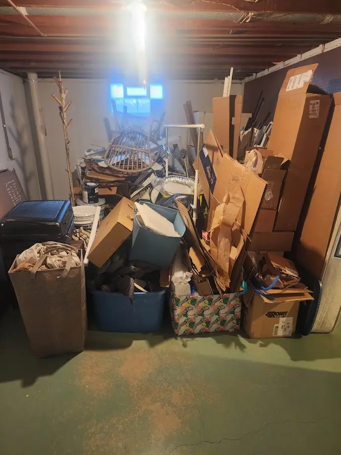 Roll-off dumpster container at job site for Concrete Dumpster Rental in Woodbury